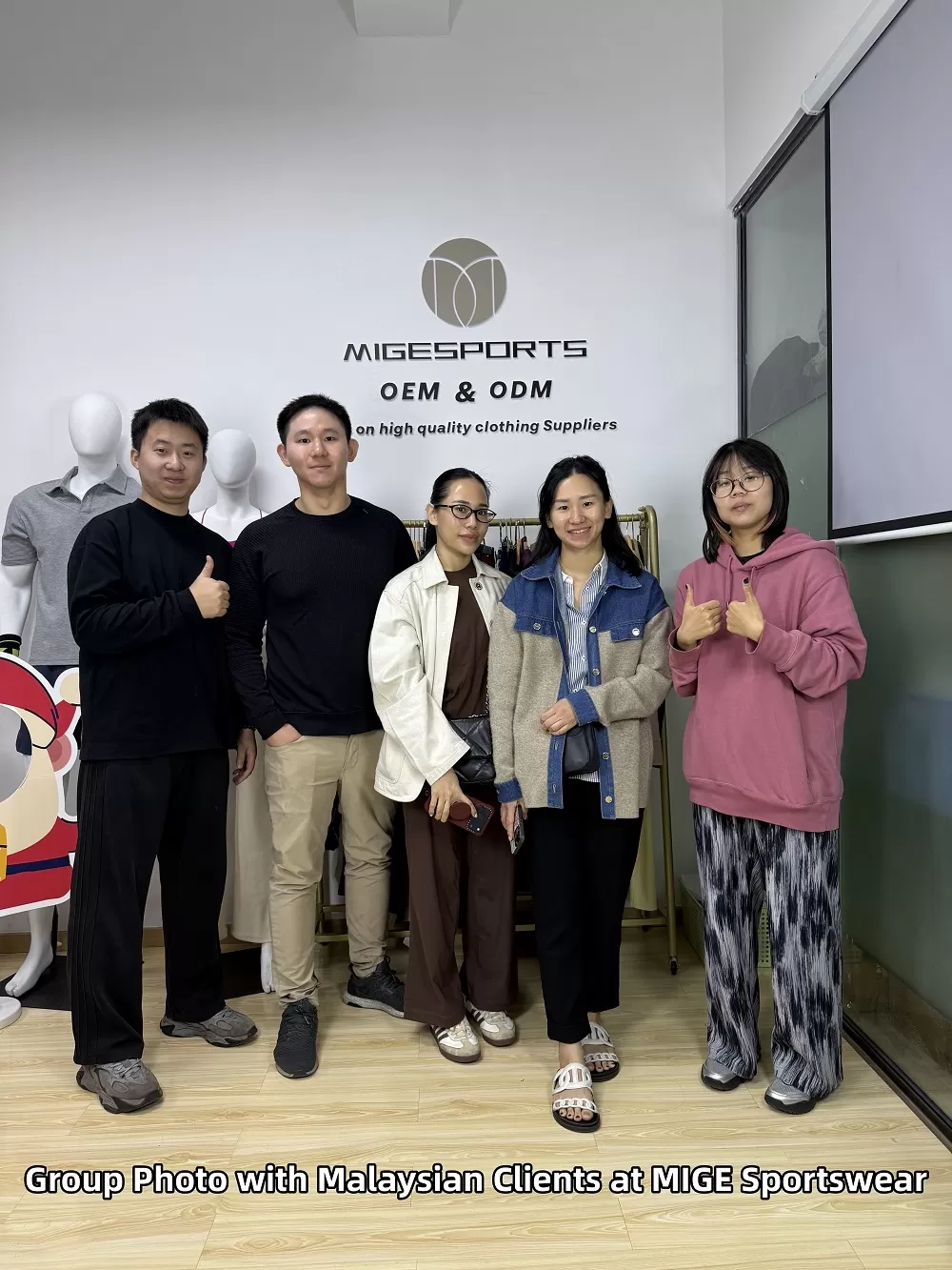 Warmly Welcome Malaysian Clients to Visit MIG Sportswear